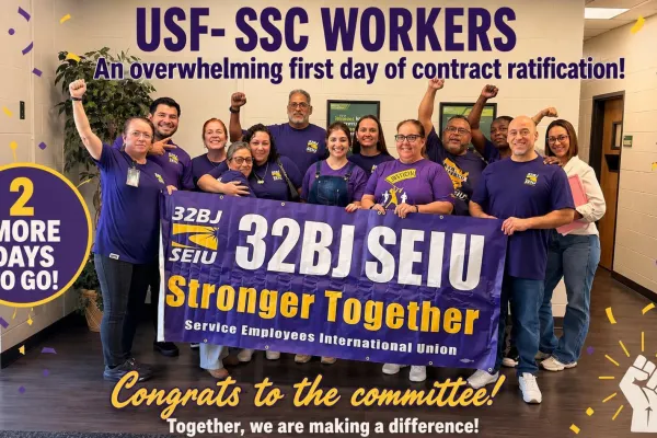 32bj seiu members celebrating with banner