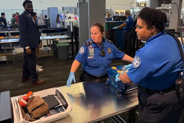 TSA officers at work