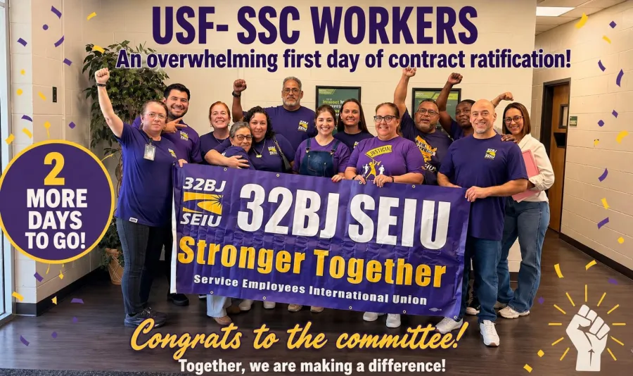 32bj seiu members celebrating with banner