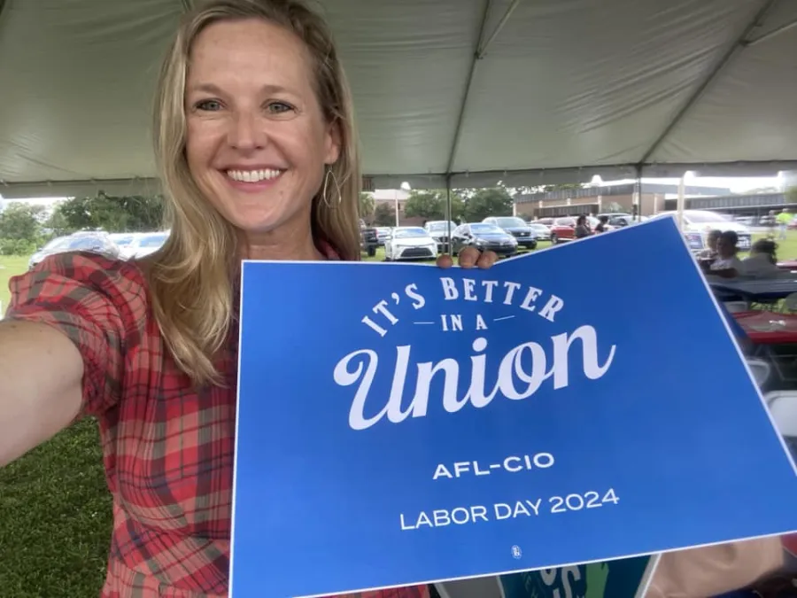 Lindsay Cross with union sign