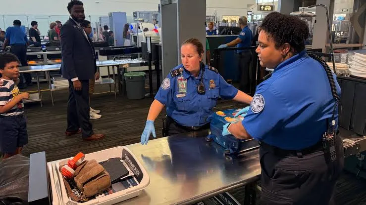 TSA officers at work